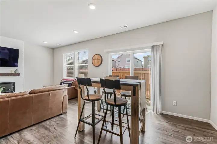 Dining room with slider beyond for easy access to the backyard.