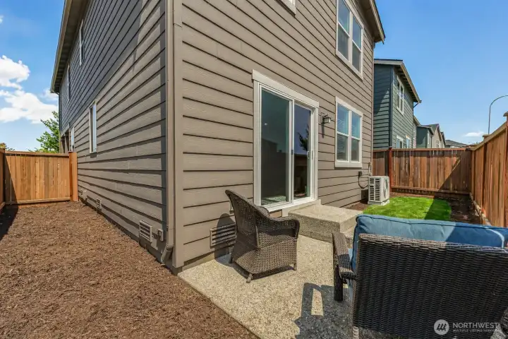 Level and fenced backyard.