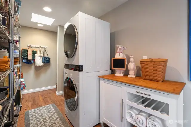 Laundry room and pantry storage. New Stacked W/D included.
