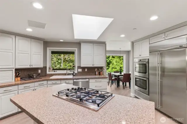 Updated Kitchen with Gas Cooktop and Stainless Steel Appliaces