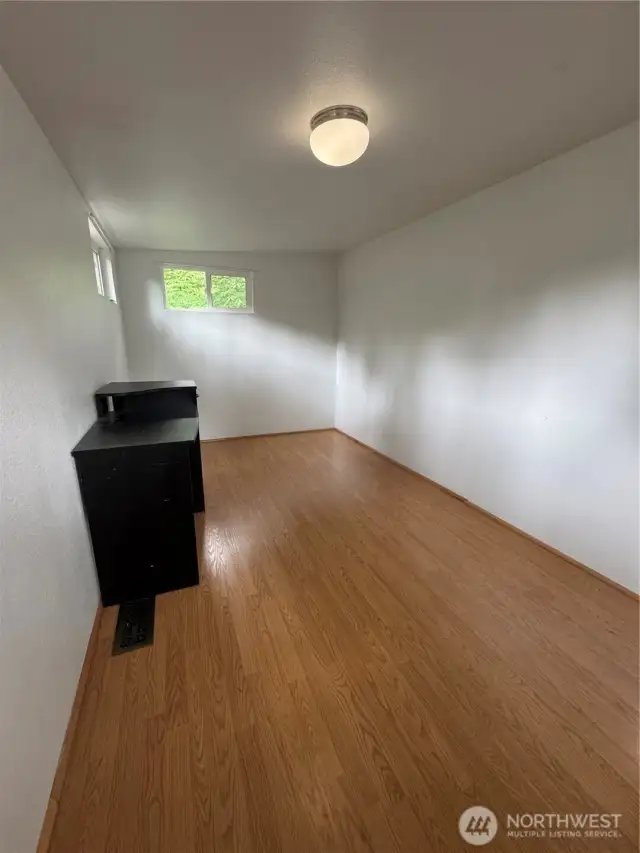 Extra finished room off of primary bedroom. Possible 3rd bedroom, office, workout room
