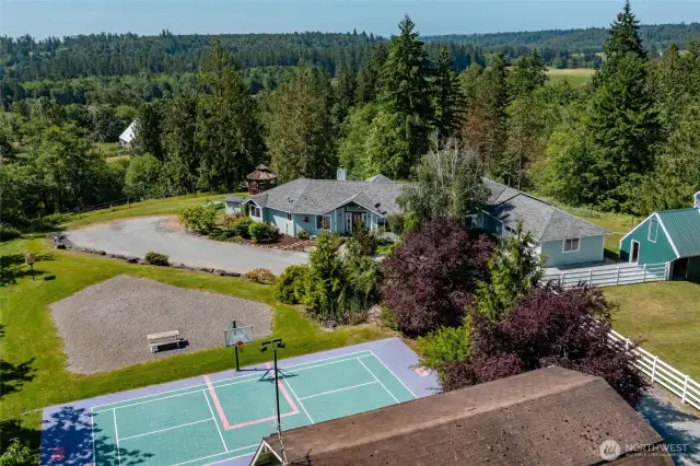 Sports court next to a picnic area with plenty of room to add play equipment for all ages!