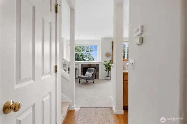 Abundant natural light and large windows create a bright, welcoming atmosphere throughout the main living space.
