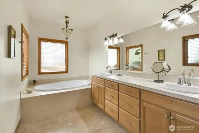 5 Piece Primary Bathroom complete with stand up shower, soaking tub, and His & Her sinks with tons of vanity storage