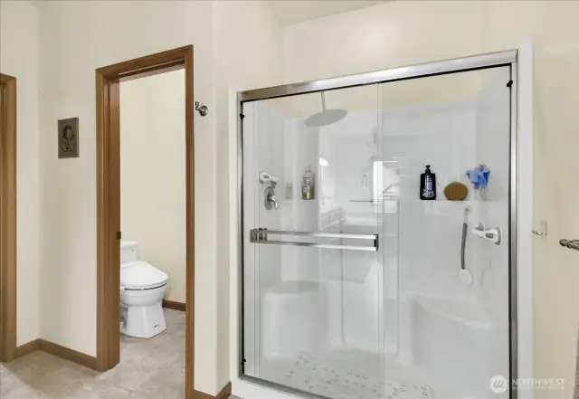 5 Piece Primary Bathroom complete with stand up shower, soaking tub, and His & Her sinks with tons of vanity storage