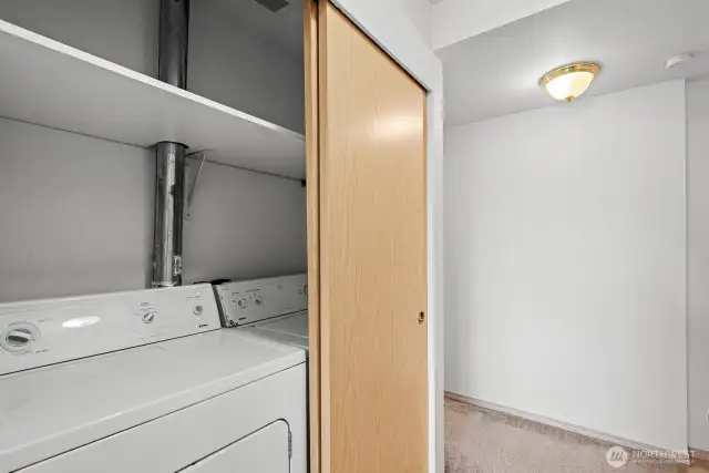 Full-sized Washer & Dryer in the Closet off the Hallway.