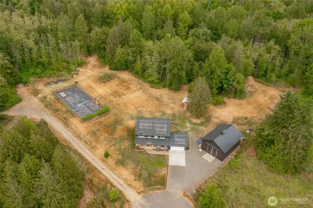 View of the home, shop, fenced garden space, orchard, pasture and woods all on 19+ acres!