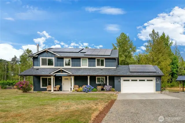 Home features 2528 sq ft, 5 bedrooms, 2.5 baths and solar panels for energy savings.