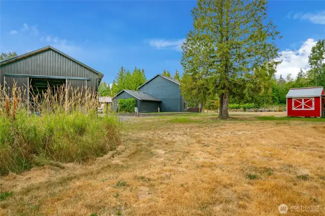 View looking back towards house and back of shop.