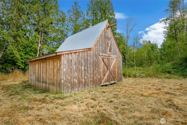Cedar barn is in great condition with loft ready for animals or whatever you need.
