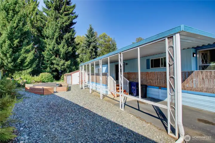 Spacious lot with raised beds for your garden.
