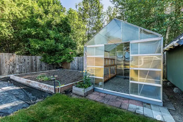 Bring your green thumb, large, raised garden bed for all your vegetables.