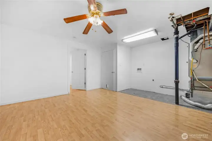 Laundry area and extra finished room