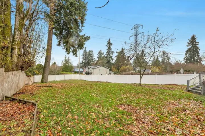 Large back yard fully fenced. looking west