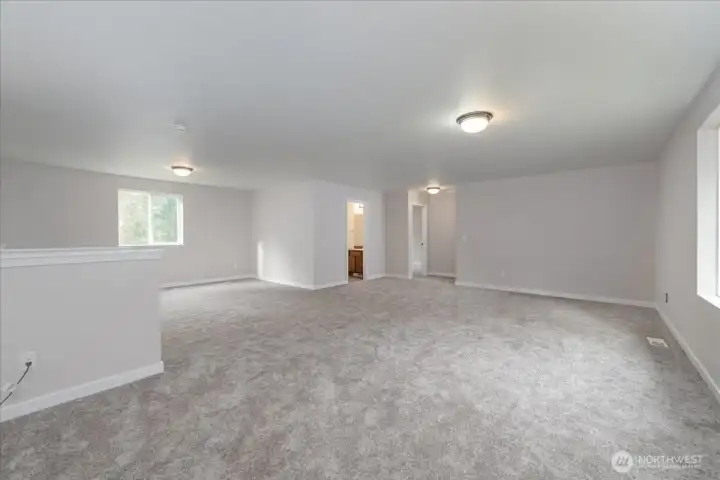 Main house: Upper level mezzanine with 4 bedrooms and a full bathroom.