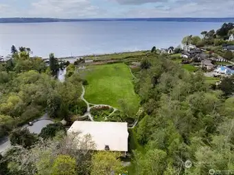 The Cove (a.k.a. Lot A) consist of 18 acres located at the west end of SW Shorebrook Drive in the city of Normandy Park, WA. It includes 700 feet of waterfront on Puget Sound, a community clubhouse, tennis courts, woods with interpretive trails, two creeks (Miller and Walker), a duck pond for salmon rearing and a wetland area. The Normandy Park Cove is privately owned by 1800 households which have an equal and undivided interest in this property. Use of the Cove property is limited to Lot A owners and their guests.