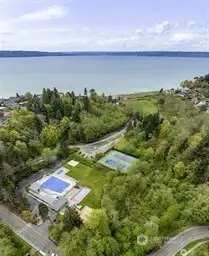 The Cove (a.k.a. Lot A) consist of 18 acres located at the west end of SW Shorebrook Drive in the city of Normandy Park, WA. It includes 700 feet of waterfront on Puget Sound, a community clubhouse, tennis courts, woods with interpretive trails, two creeks (Miller and Walker), a duck pond for salmon rearing and a wetland area. The Cove is privately owned by 1800 households which have an equal and undivided interest in this property. Use of the Cove property is limited to Lot A owners and their guests....