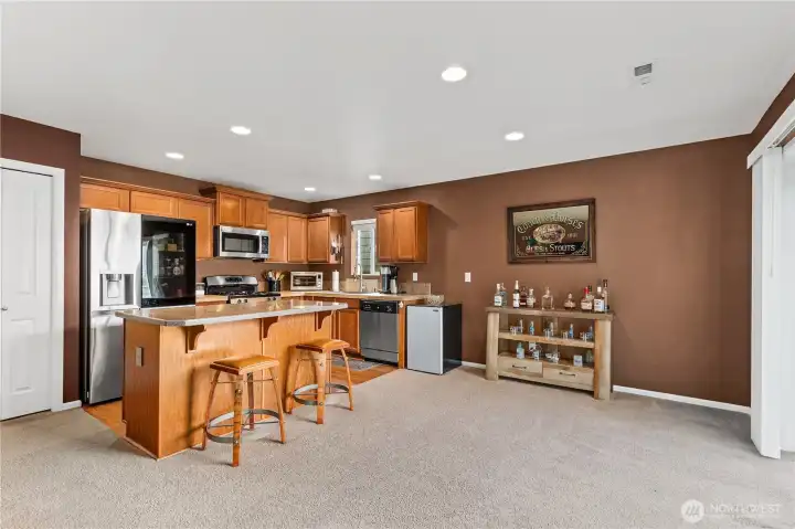 Dining area positioned between living room and kitchen for easy entertaining and functional daily use.