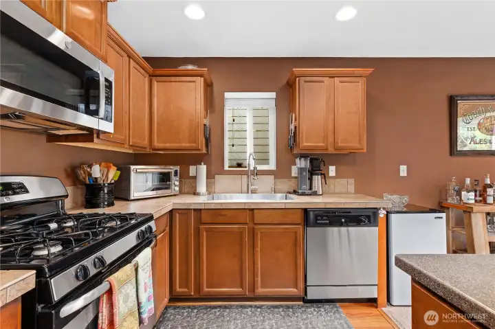 Well-appointed kitchen with clean finishes, durable new LVP flooring, and excellent workflow for everyday use.