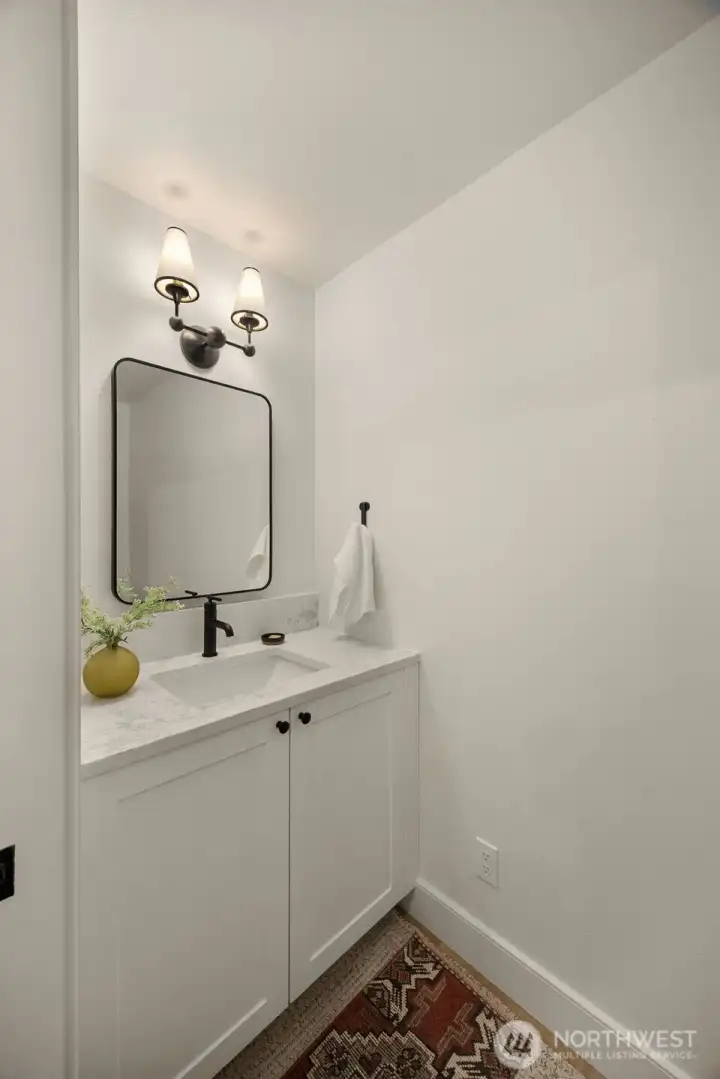 Lower level 1/2 bath in utility room.