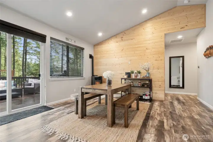 Slider leads to the expansive deck, perfect for entertaining or relaxing!