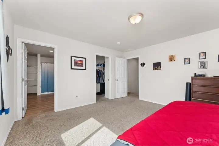 Primary bedroom looking towards the primary bathroom.
