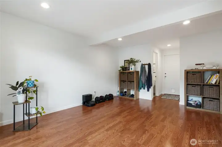 Family room leads to   the laundry in the garage
