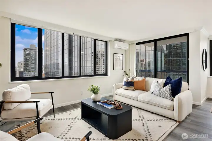 Spacious living area (big enough to tuck a work-from-home desk behind the couch!) is efficiently cooled & heated year round thanks to the newer Mitsubishi mini split.