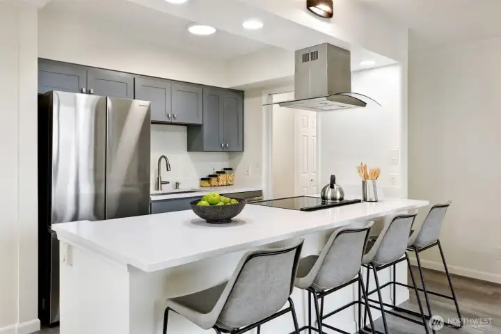 No shortage of counter space thanks to this stretch of beautiful quartz!