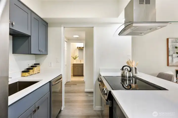 All new appliances include fridge, dishwasher and range, with oversized sink.