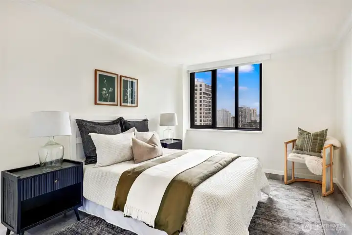 The large bedroom easily accommodates a king-sized bed (closet at left).