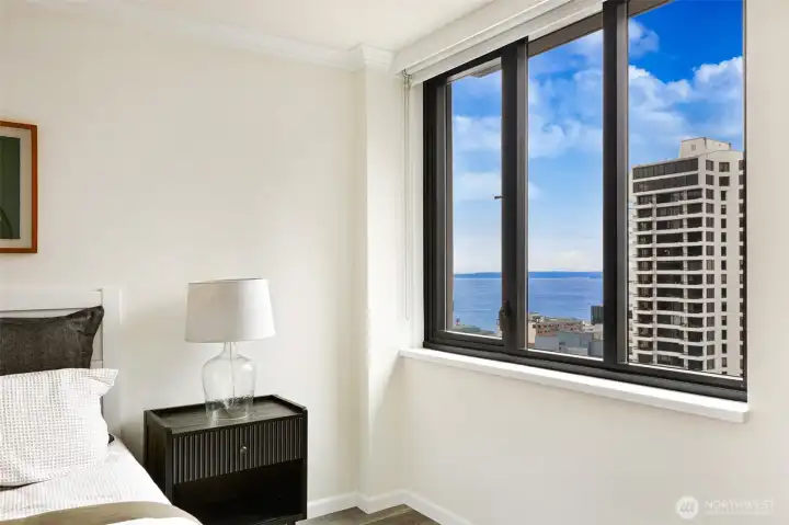 Soft morning light gently wakes you while the city comes to life 18 floors below.