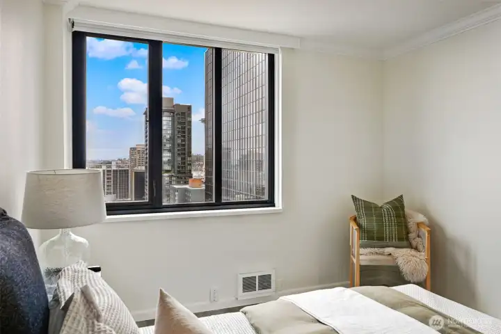 With your head on the pillow at night, you'll fall asleep to the gentle glow of the Space Needle, more easily viewed in person than in this photo!