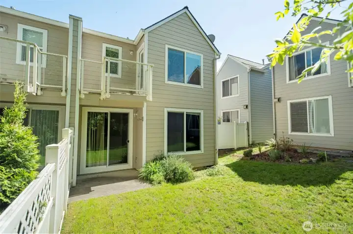 Backyard view of townhome