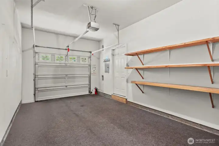 1-car garage with built-in shelves