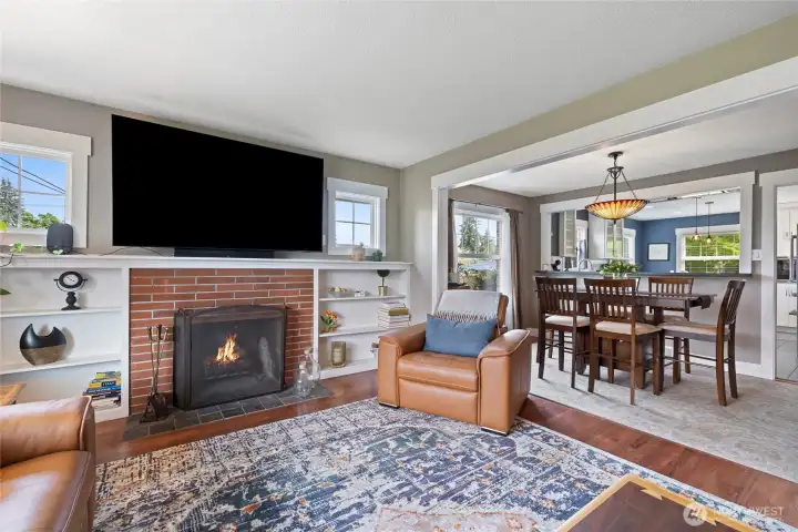 Central living with living and dining room seamlessly blends this space for family gatherings and entertaining.