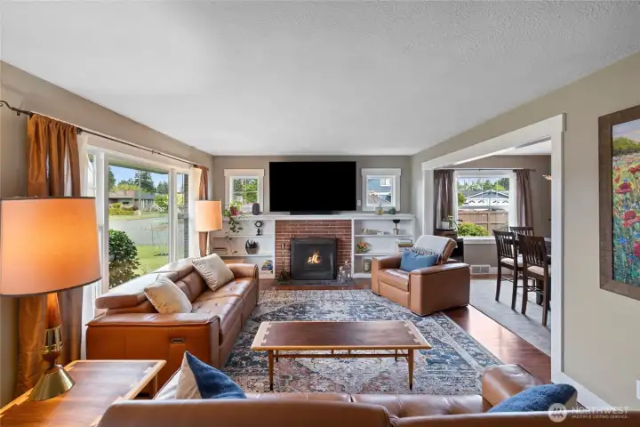 Living room lives large with abundant light.