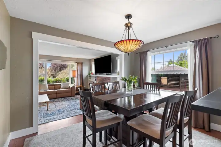 Dining room faces East for beautiful morning sunrises looking out to the manicured yard.