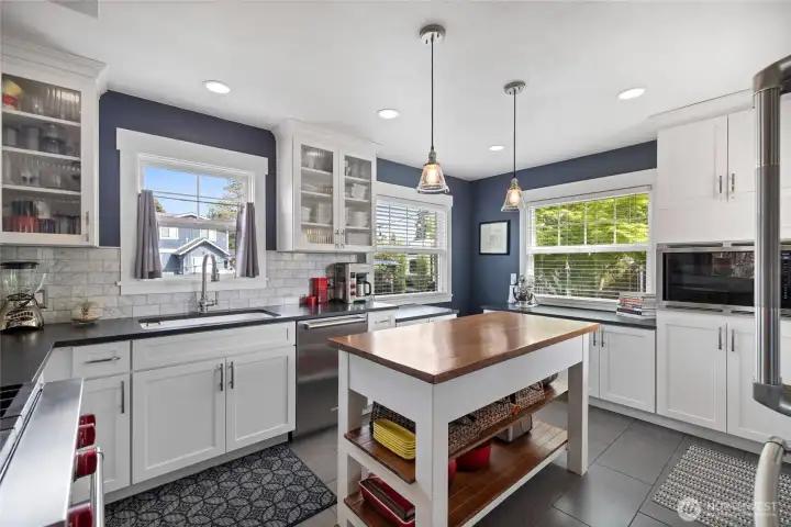 Completely remodeled kitchen with quality cabinetry, dove-tail and soft close drawers. Plenty of workspace and endless storage for all of your serving pieces.