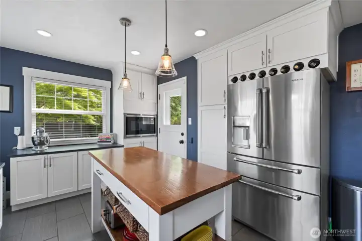 Counter depth Fridge, updates windows throughout the home are operational for a nice breeze into this space.