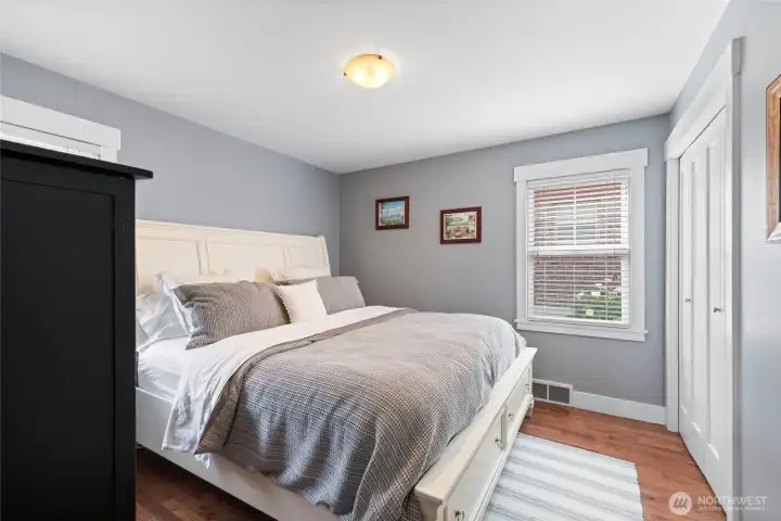 Main floor bedroom just off the bathroom suits a King Size bed. Window looks to the backyard for privacy and quietness.