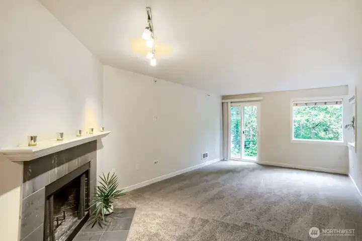 Living Room w/ Wood Burning Fireplace