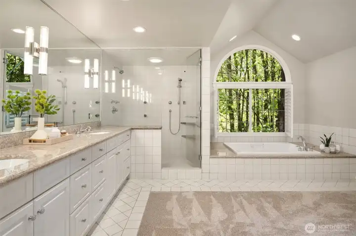 A beautifully designed five-piece primary bath with timeless finishes and a calming feel.