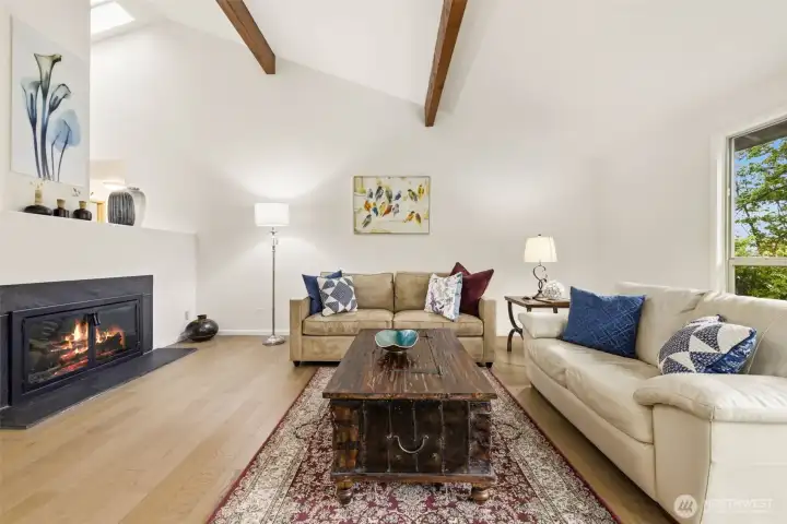 Vaulted Living Room with Fireplace and Exposed Beams Vaulted Living Room with Fireplace and Exposed Beams