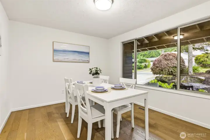 Dining Area with Large Picture Window Dining Area with Large Picture Window