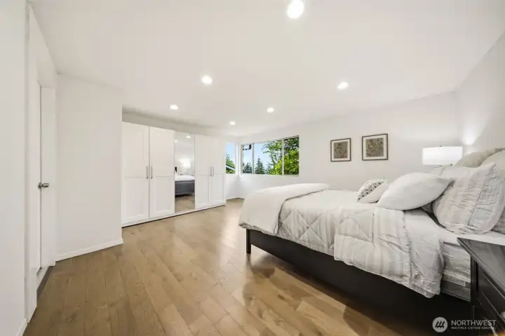 Spacious Primary Suite with Serene Views Spacious Primary Suite with Serene Views