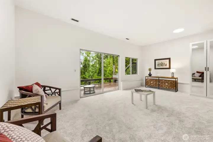 Lower-Level Family Room with New Carpet, has Deck Access Lower-Level Family Room with New Carpet, has Deck Access