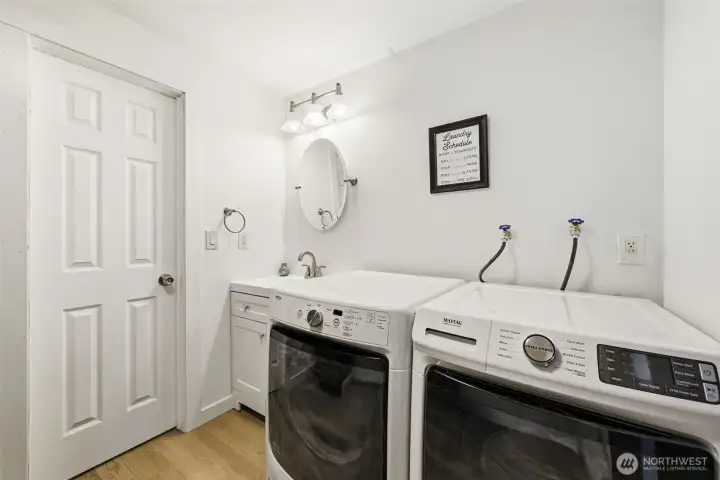 Lower level Laundry Room with Sink and Bathroom (behind door) Lower level Laundry Room with Sink and Bathroom (behind door)