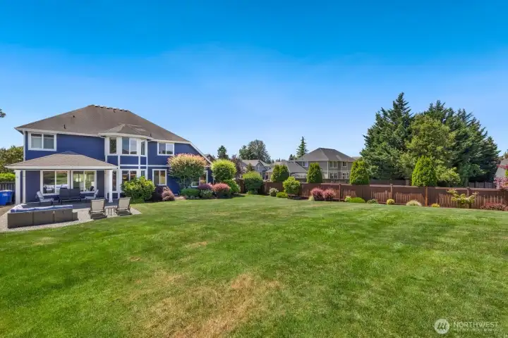 Generously sized and fully fenced, this back yard is perfect for play, gardening and private enjoyment! Generously sized and fully fenced, this back yard is perfect for play, gardening and private enjoyment!
