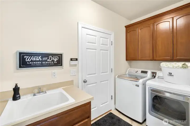 Laundry off garage. Laundry off garage.